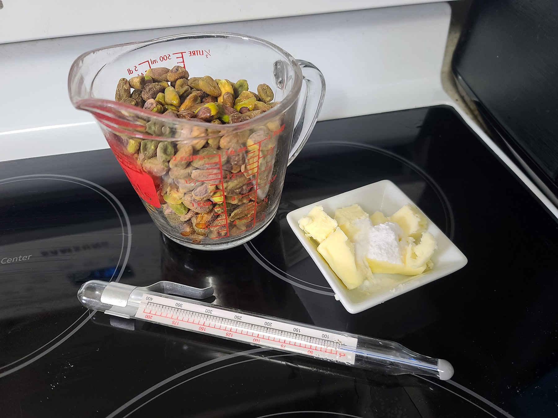 Pistachios, butter, baking soda, and a candy thermometer.