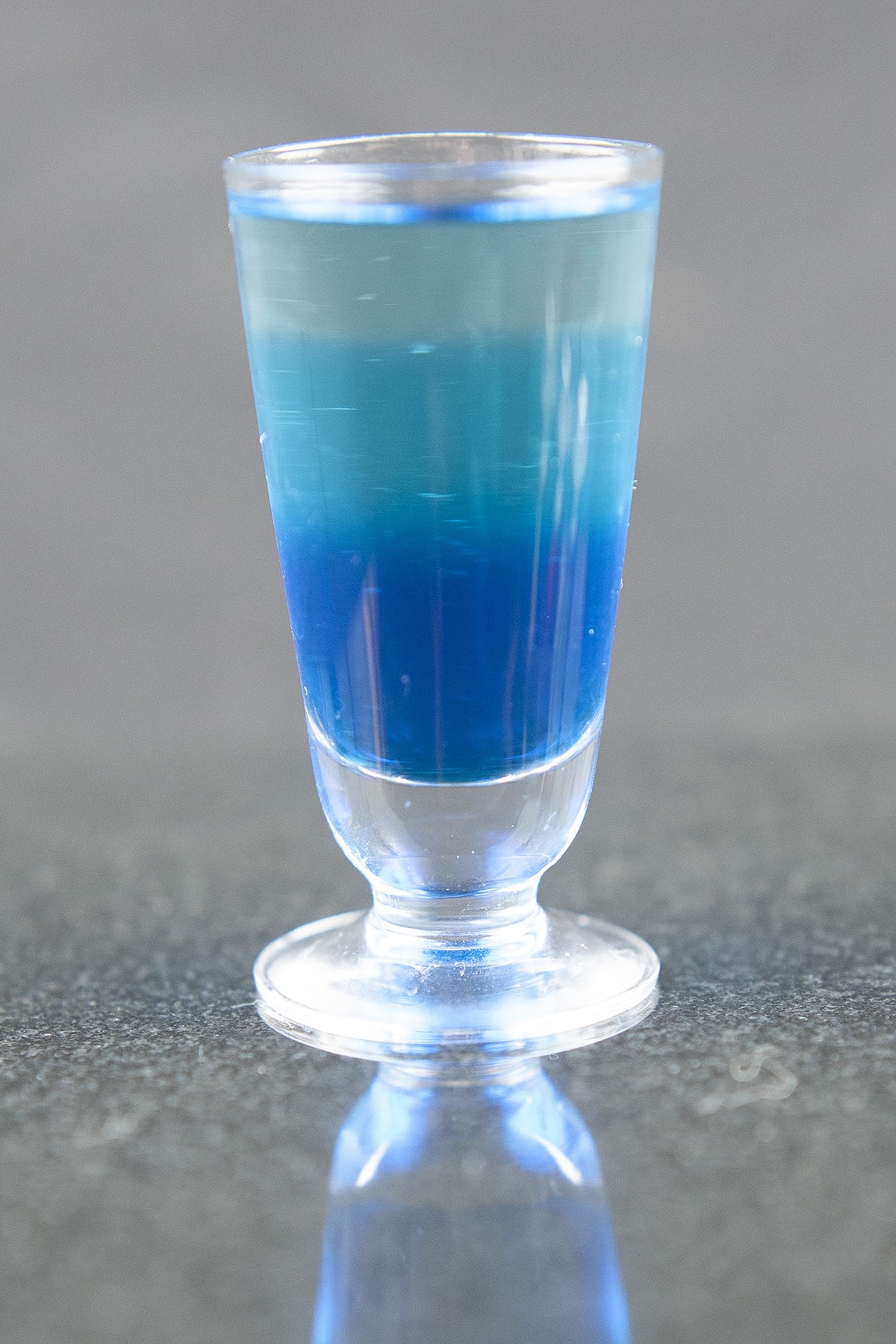 A layered shooter in shades of blue.