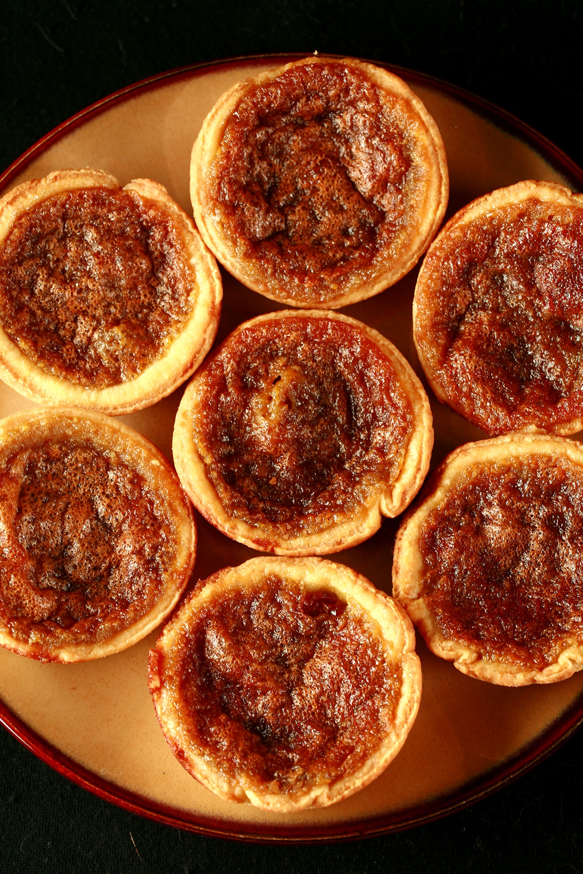 A plate of maple buttertarts.