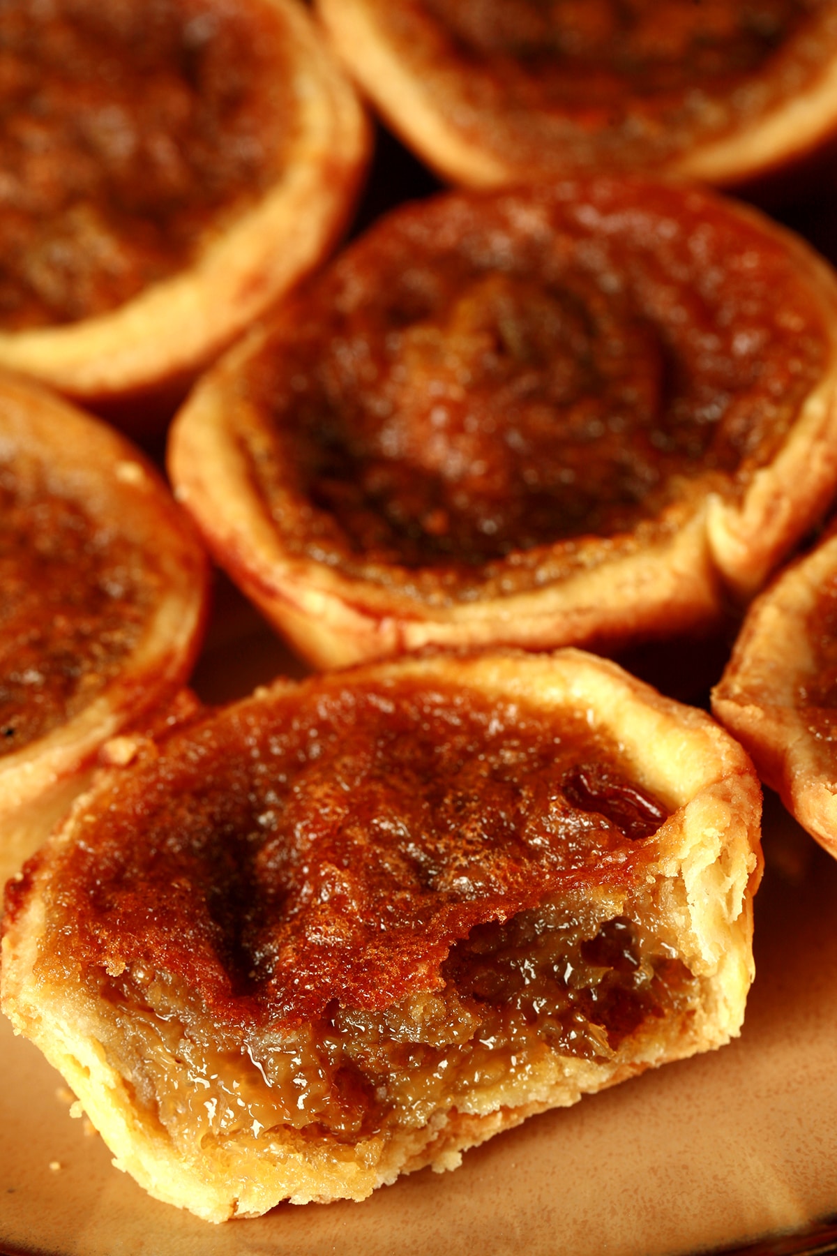 A plate of maple buttertarts.