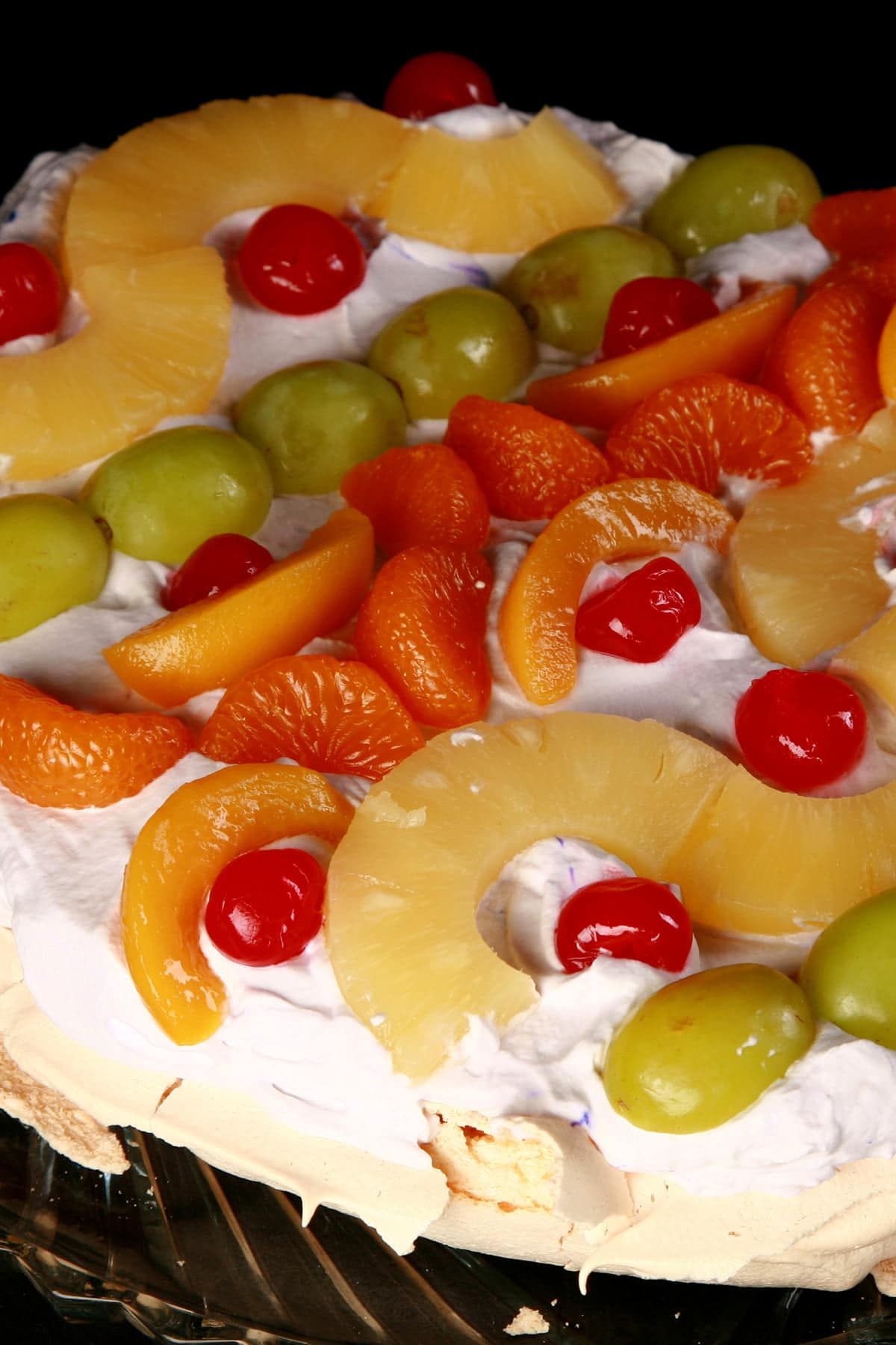 A close up view of an Easter Egg themed pavlova.