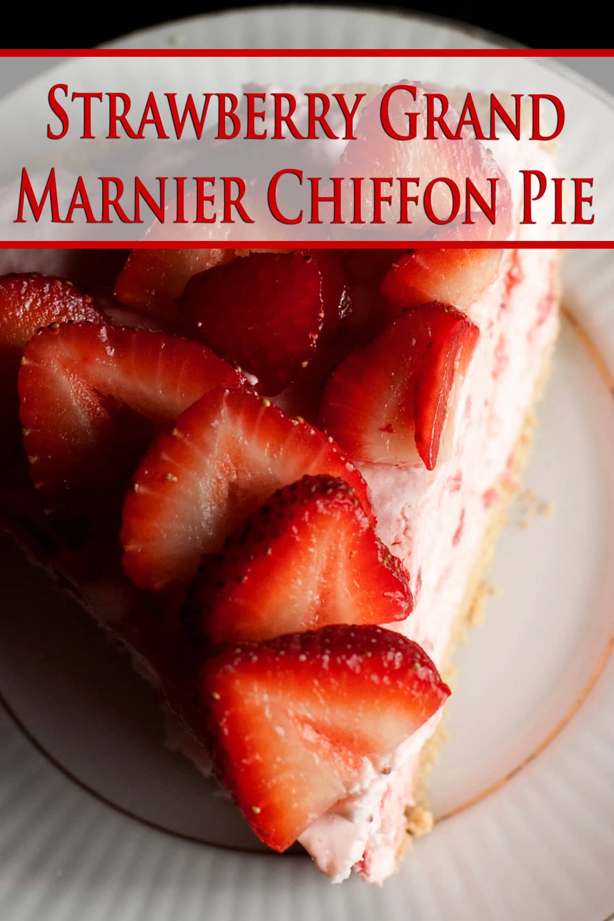 A slice of strawberry Grand Marnier Chiffon Pie on a small white plate.