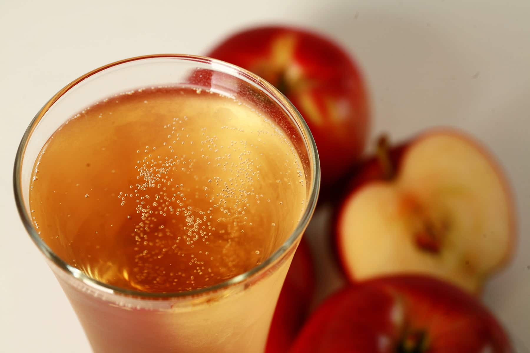 A glass of home brewed hard apple cider, made using this hard apple cider recipe.