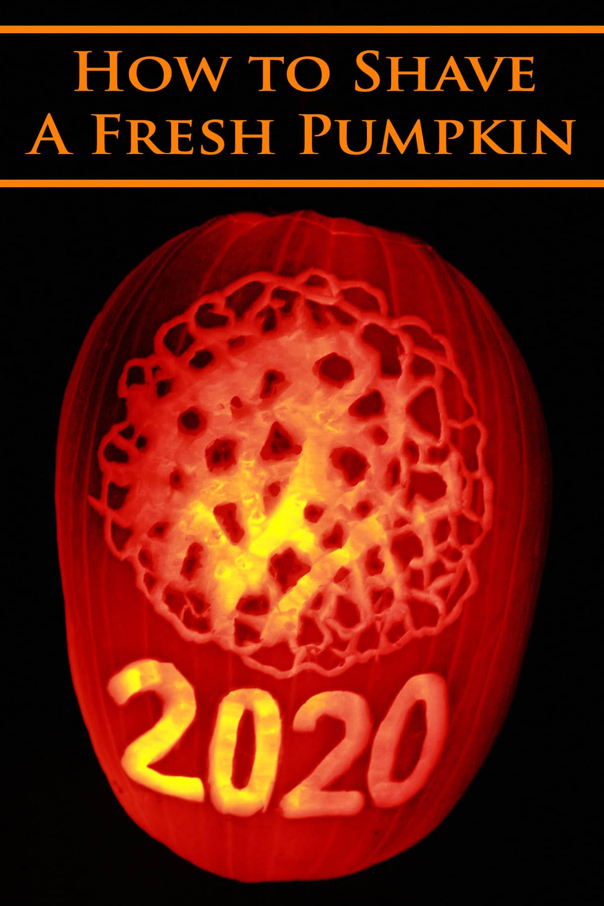 A Halloween pumpkin carved with a coronavirus design and 2020.