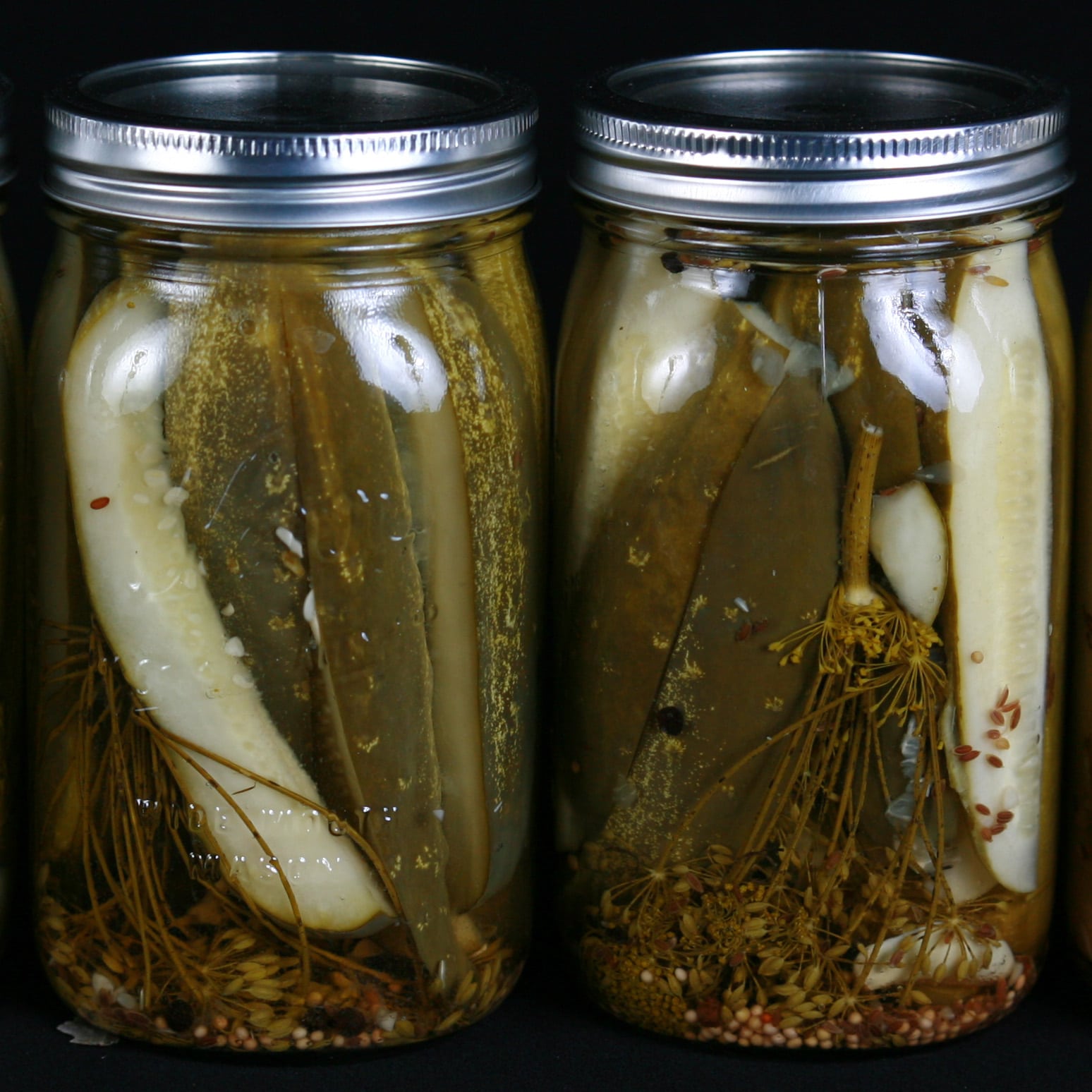 2 large jars of homemade dill pickles.