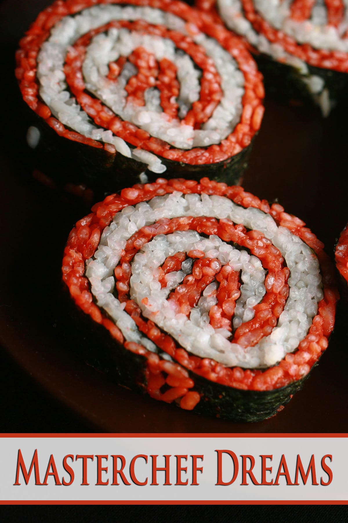 A close up view of a plate of sushi shaped to look like the Masterchef logo.