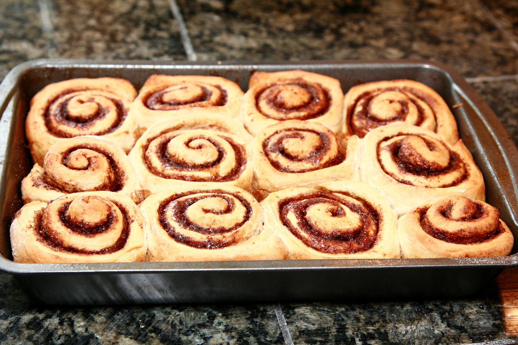 A pan of baked chai rolls.