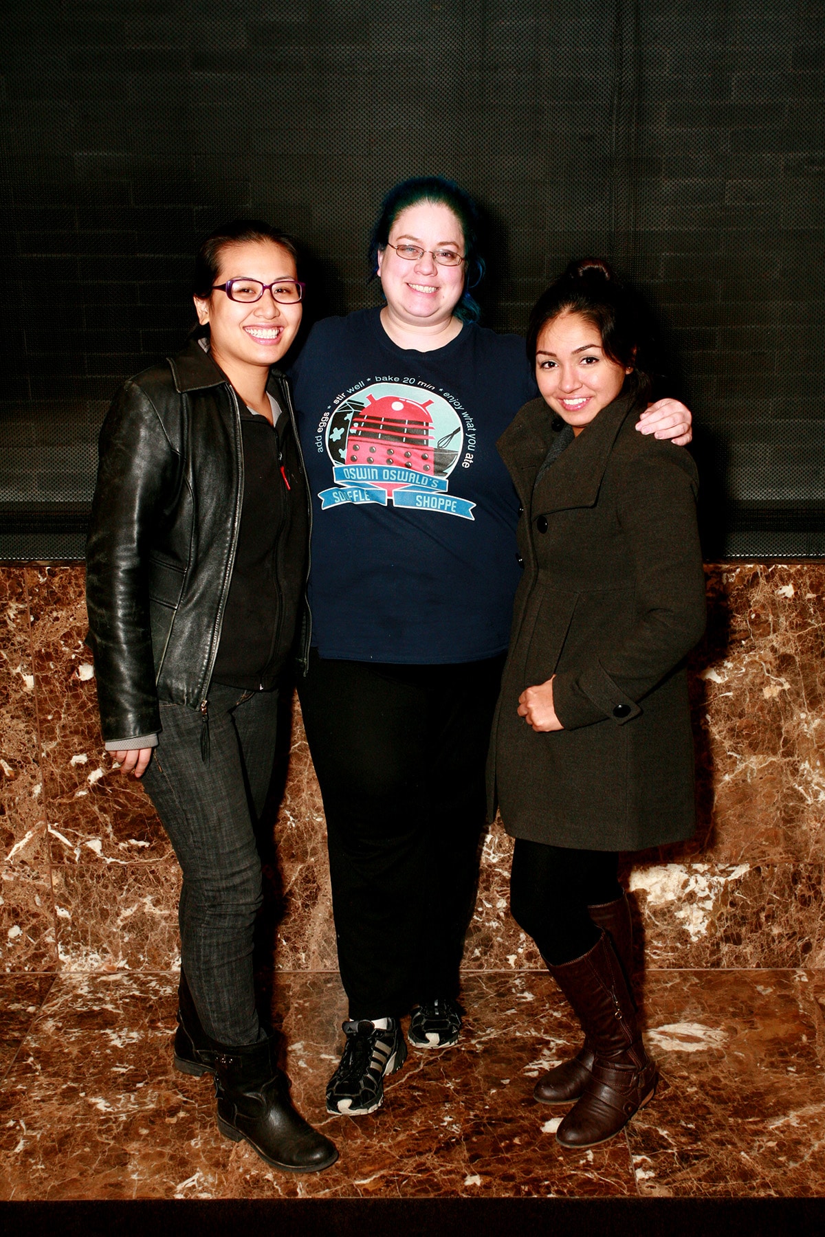 3 women, smiling at the camera.