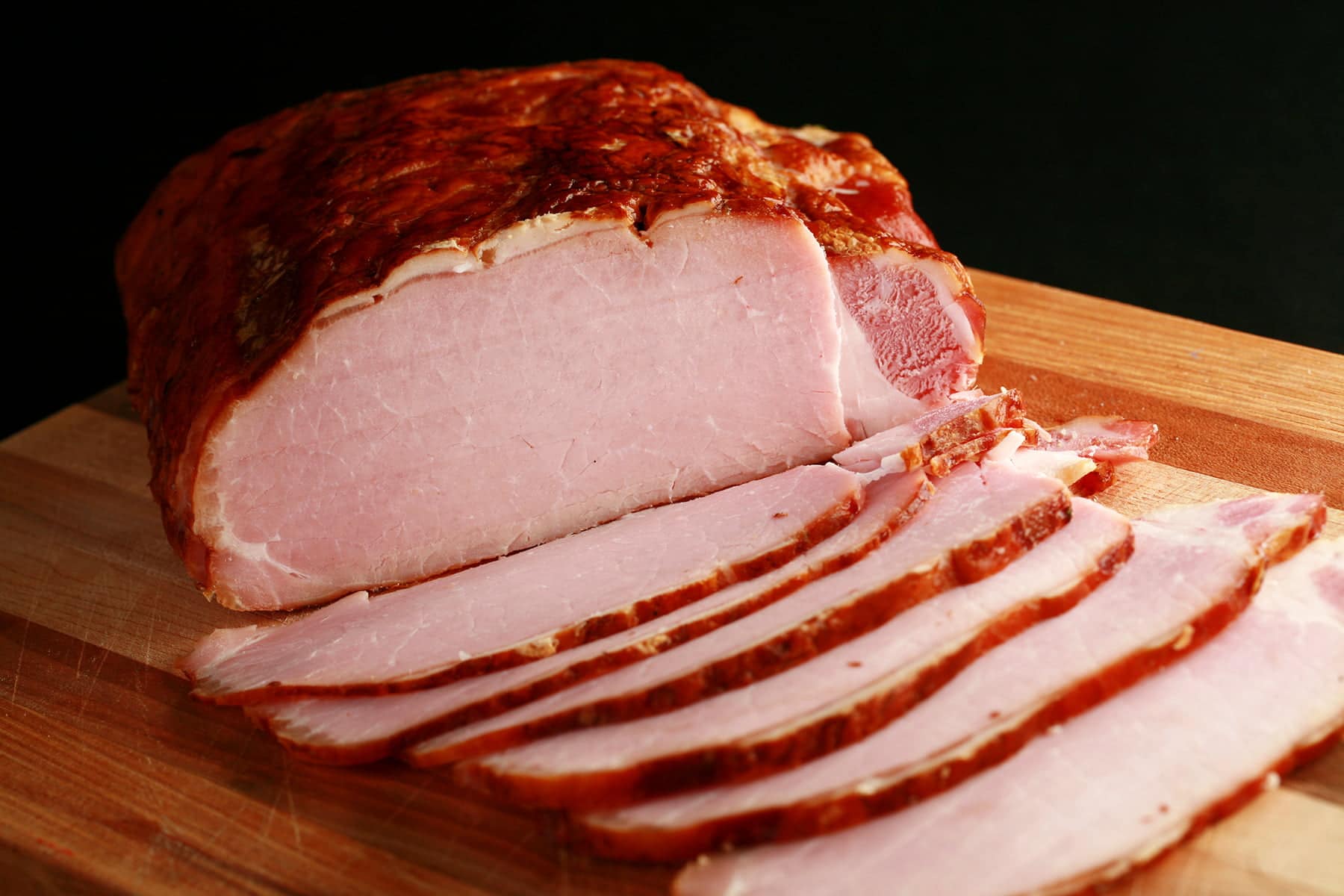 A cured and smoked pork loin, sliced - proper back bacon!