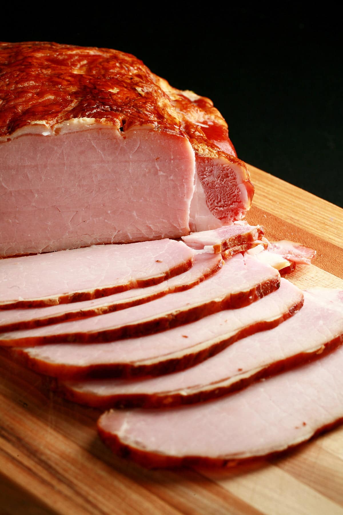 A cured and smoked pork loin, sliced - proper back bacon!