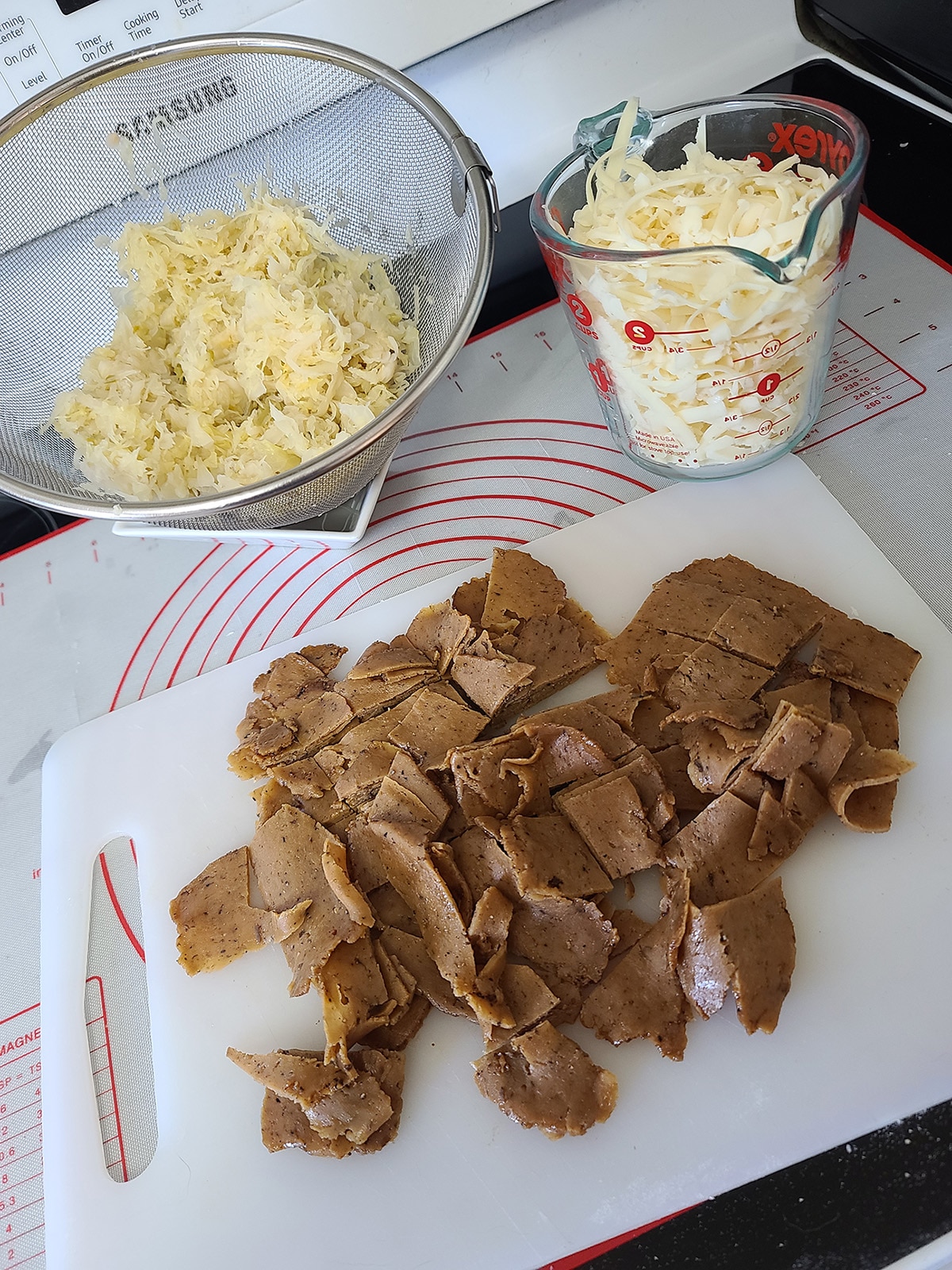 Chopped vegetarian pastrami, drained sauerkraut, and shredded Swiss cheese.