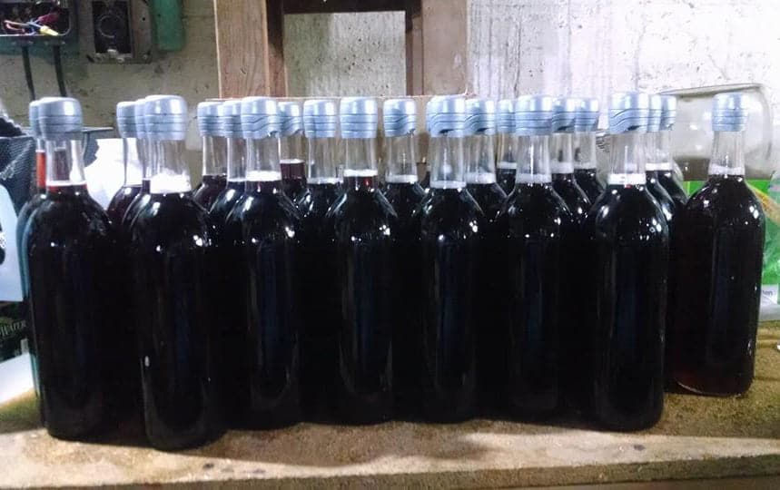 Bottles of Cherry Wine lined up