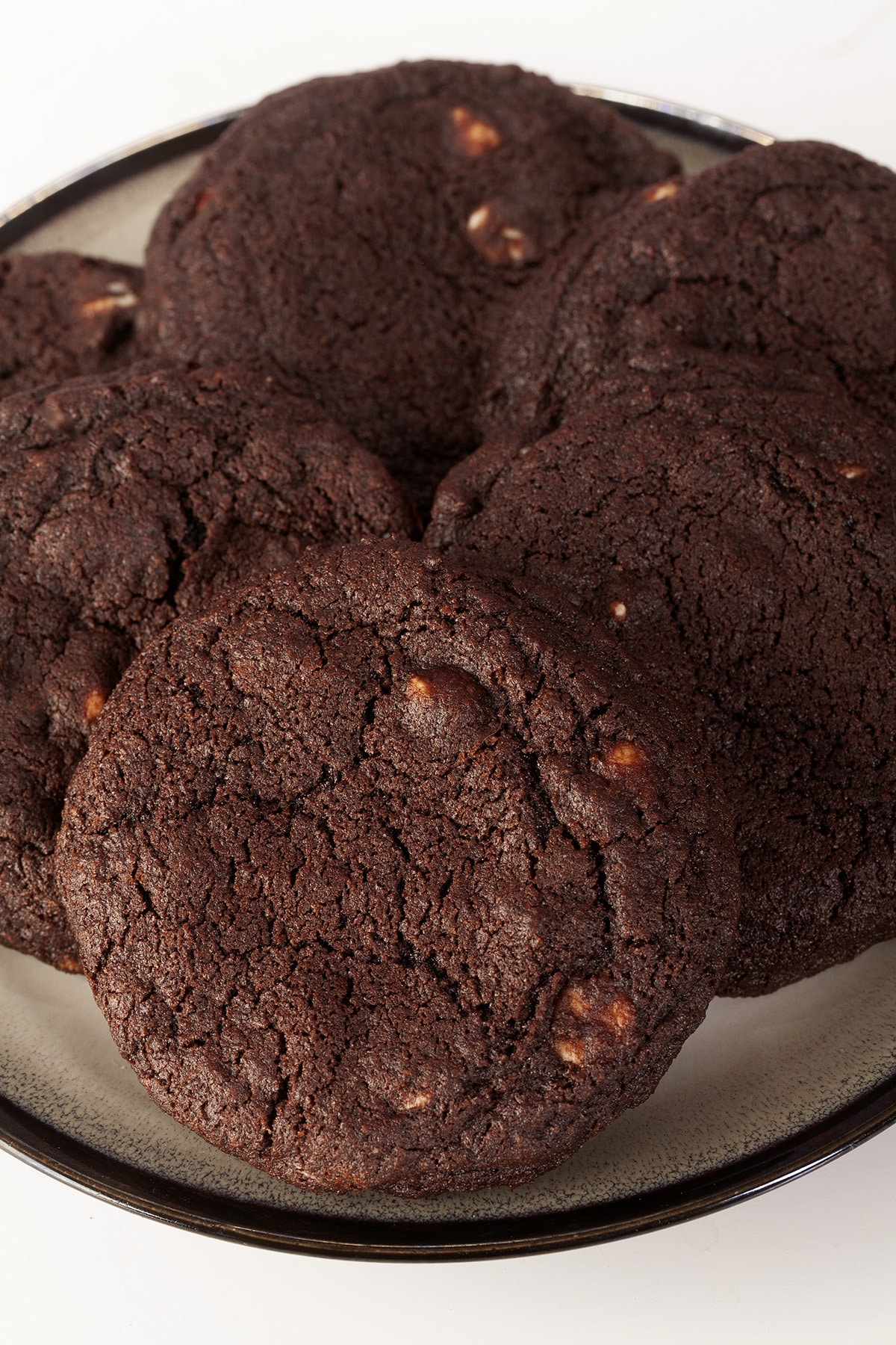 A plate of chewy chocolate white chip cookies.