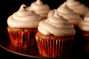 A close up photo of a tray of Chai Cupcakes.