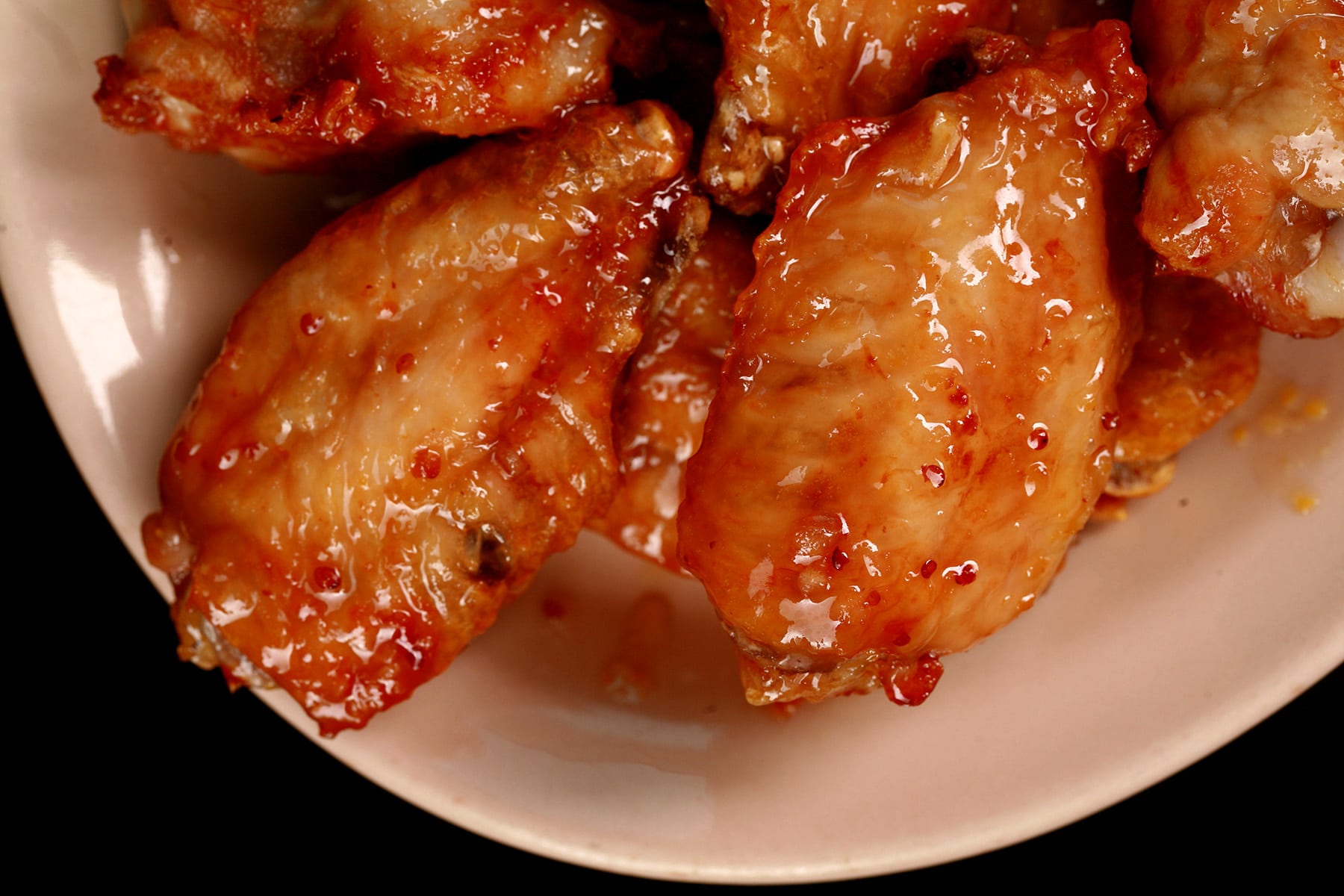 A small plate of maple dijon glazed wings.