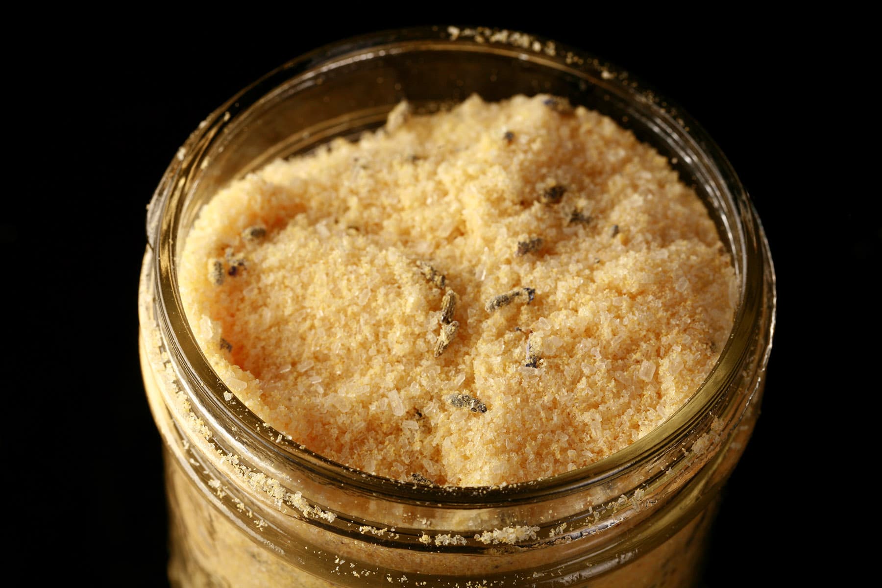 A mason jar of homemade mustard bath.