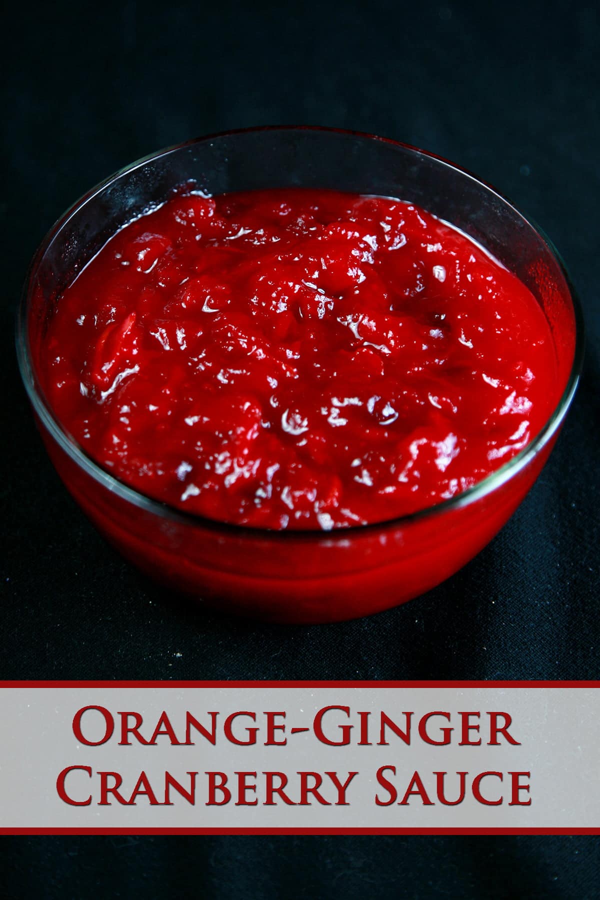 Close up view of a bowl of chunky cranberry sauce.