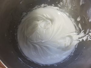 A bowl of meringue, stiff peaks showing