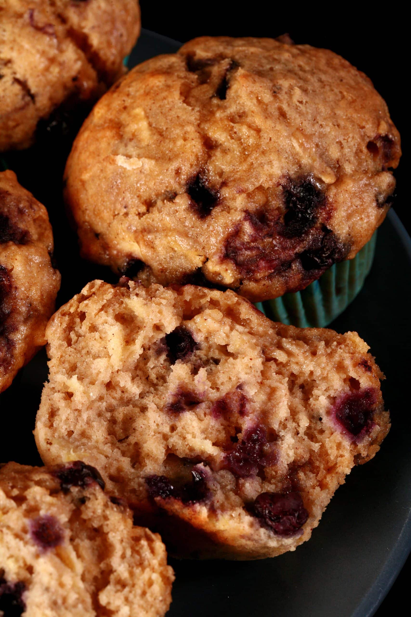 A plate of blueberry apple muffins.