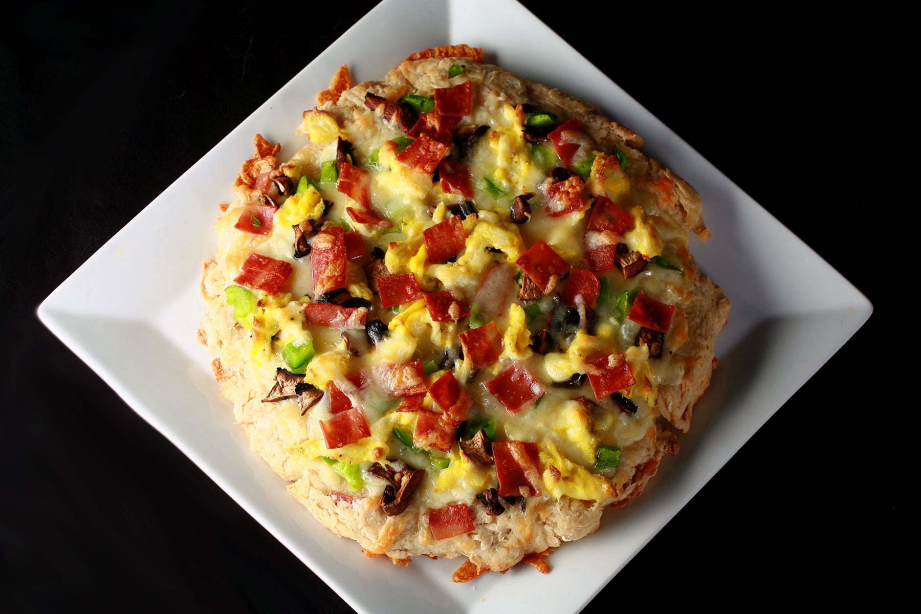 A large breakfast biscuit pizza.