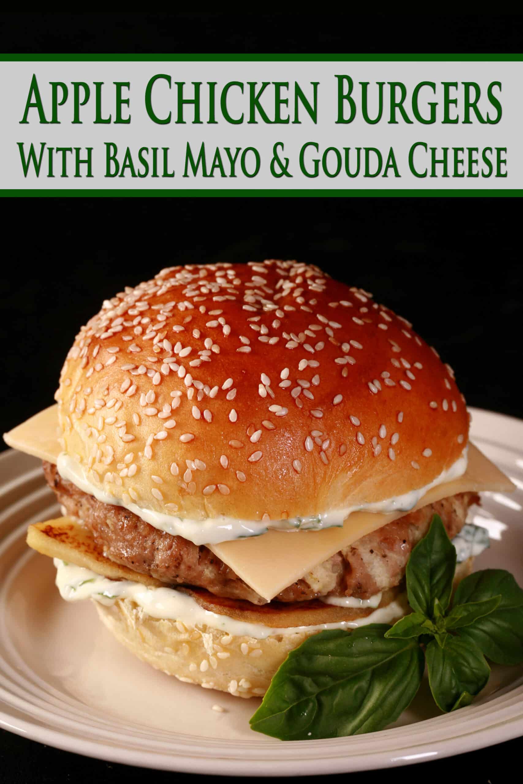 An apple chicken burger with basil mayo and gouda cheese.