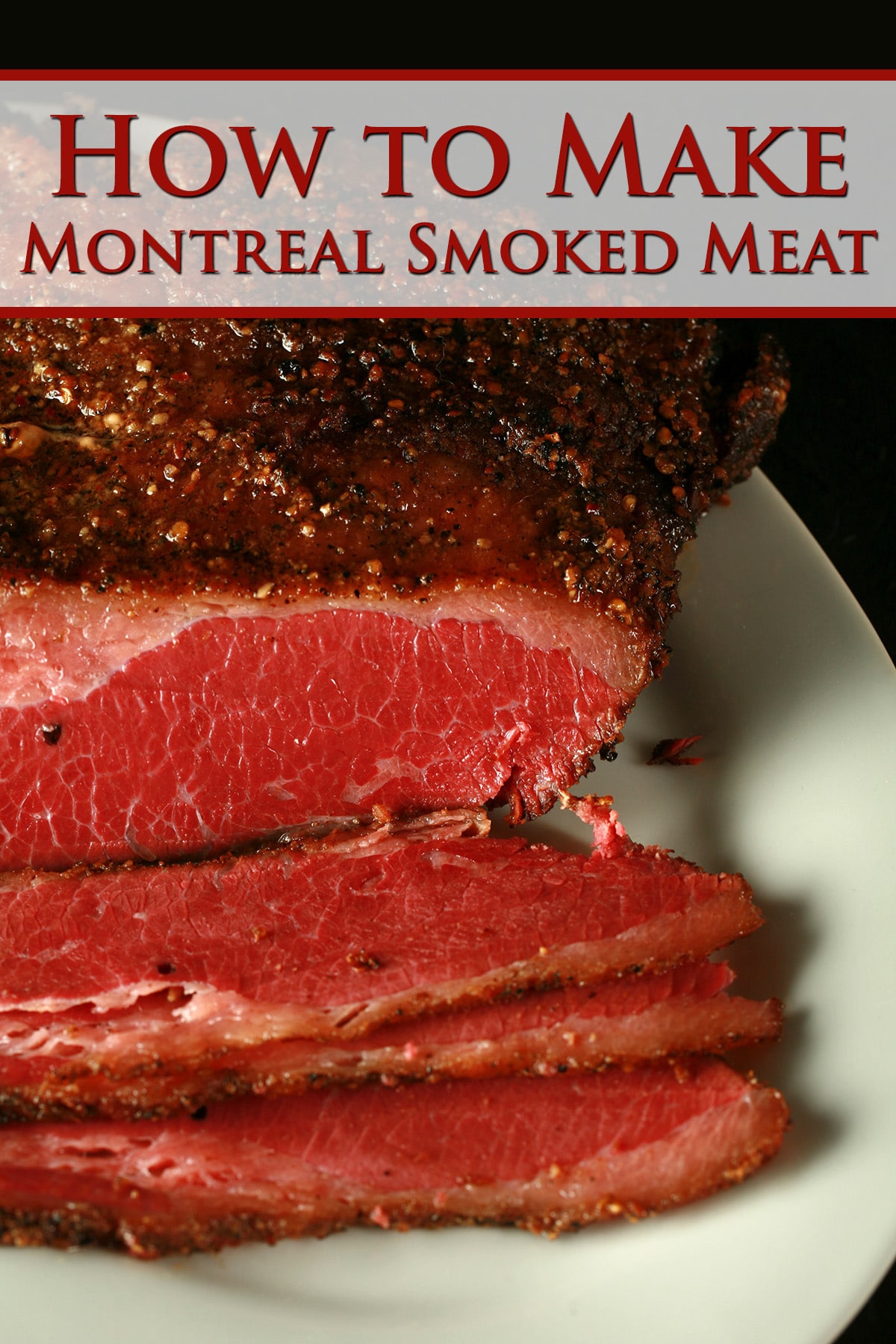 A large slab of Montreal Smoked Meat on a white plate. Severeal slices have been cut from the end in the foreground, revealing a bright red meat.