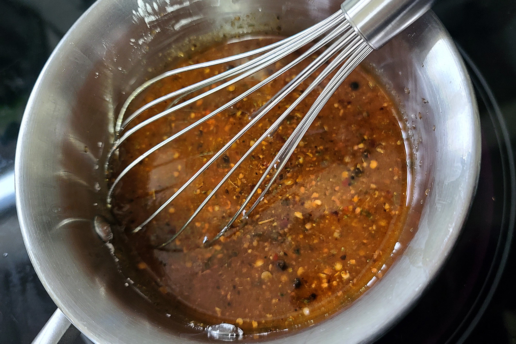 A small pot of Montreal Steak Spice Marinade.