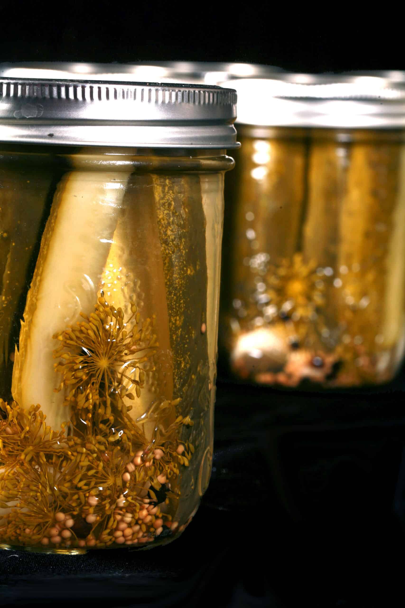 Several jars of homemade pickles.