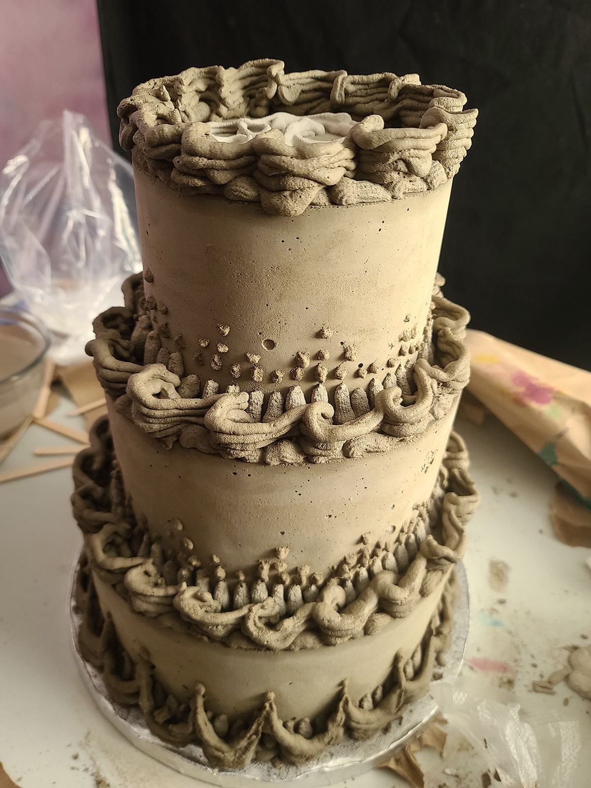 A 3 tiered wedding cake - Lambeth style - completely made from cement.