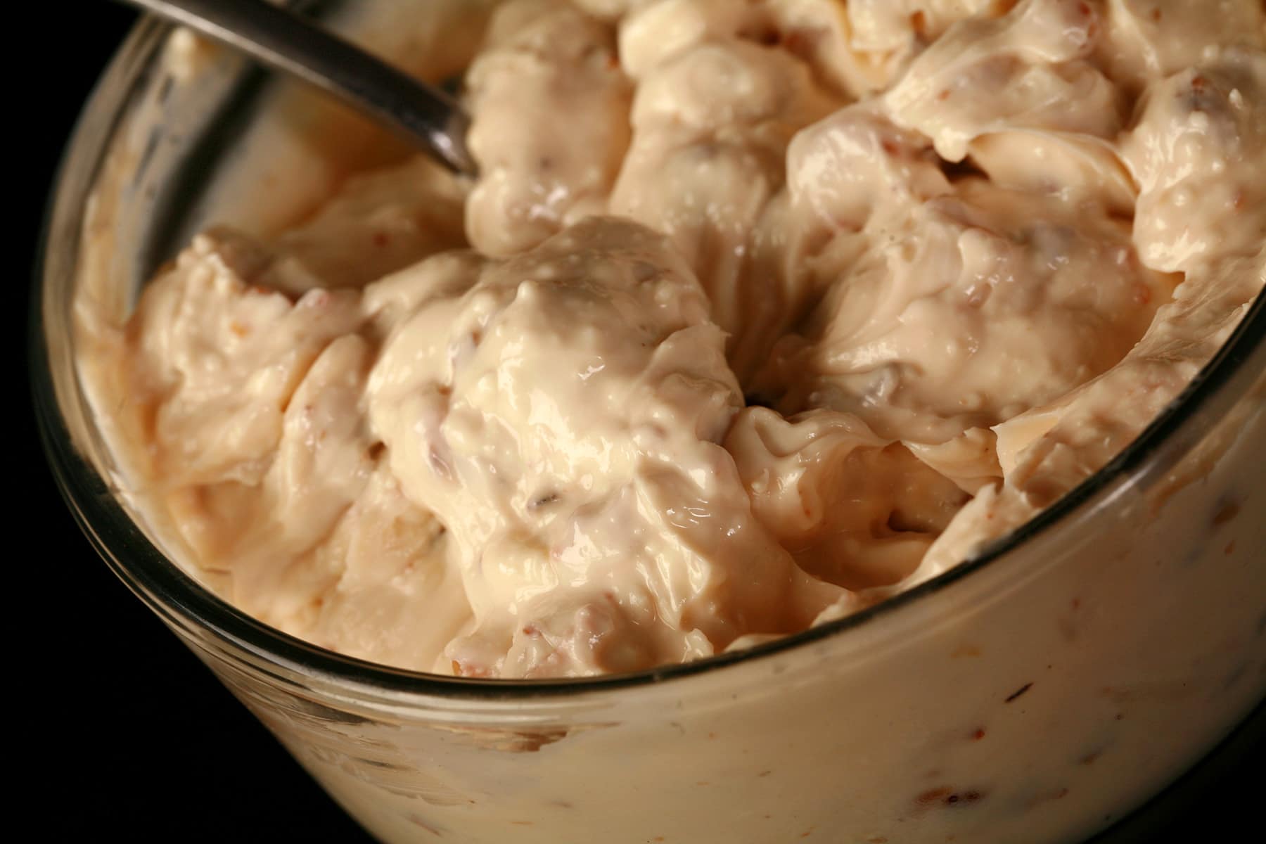 A glass dish of homemade maple walnut cream cheese.