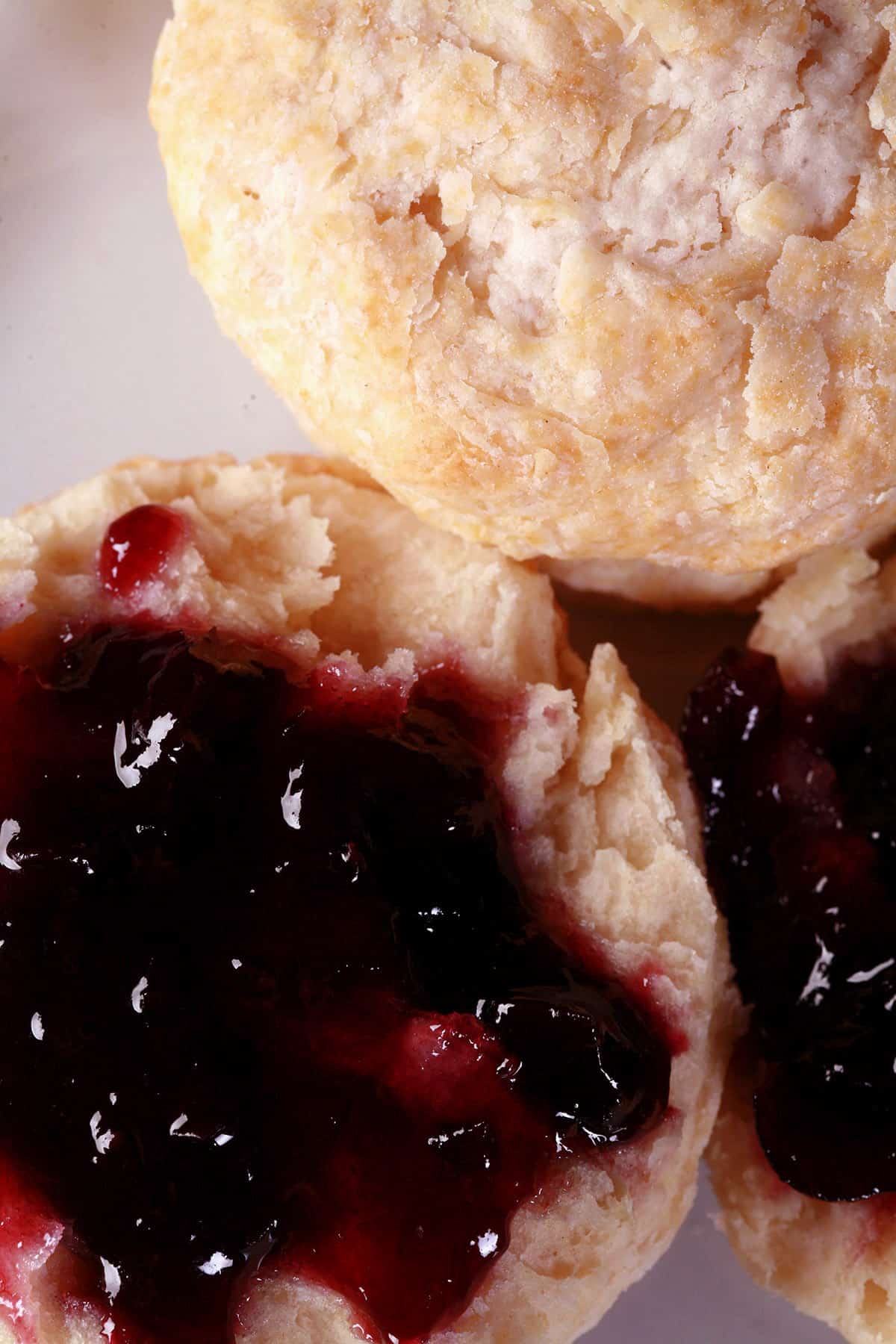 An easy baking powder biscuit split in half and spread with grape jelly.