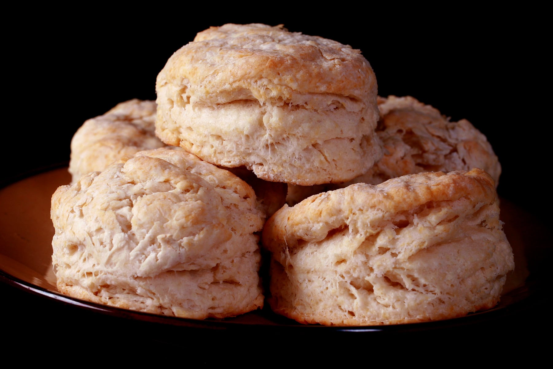 A plate of homemade baking powder biscuits.
