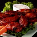 A platter of crispy smoked chicken wings.