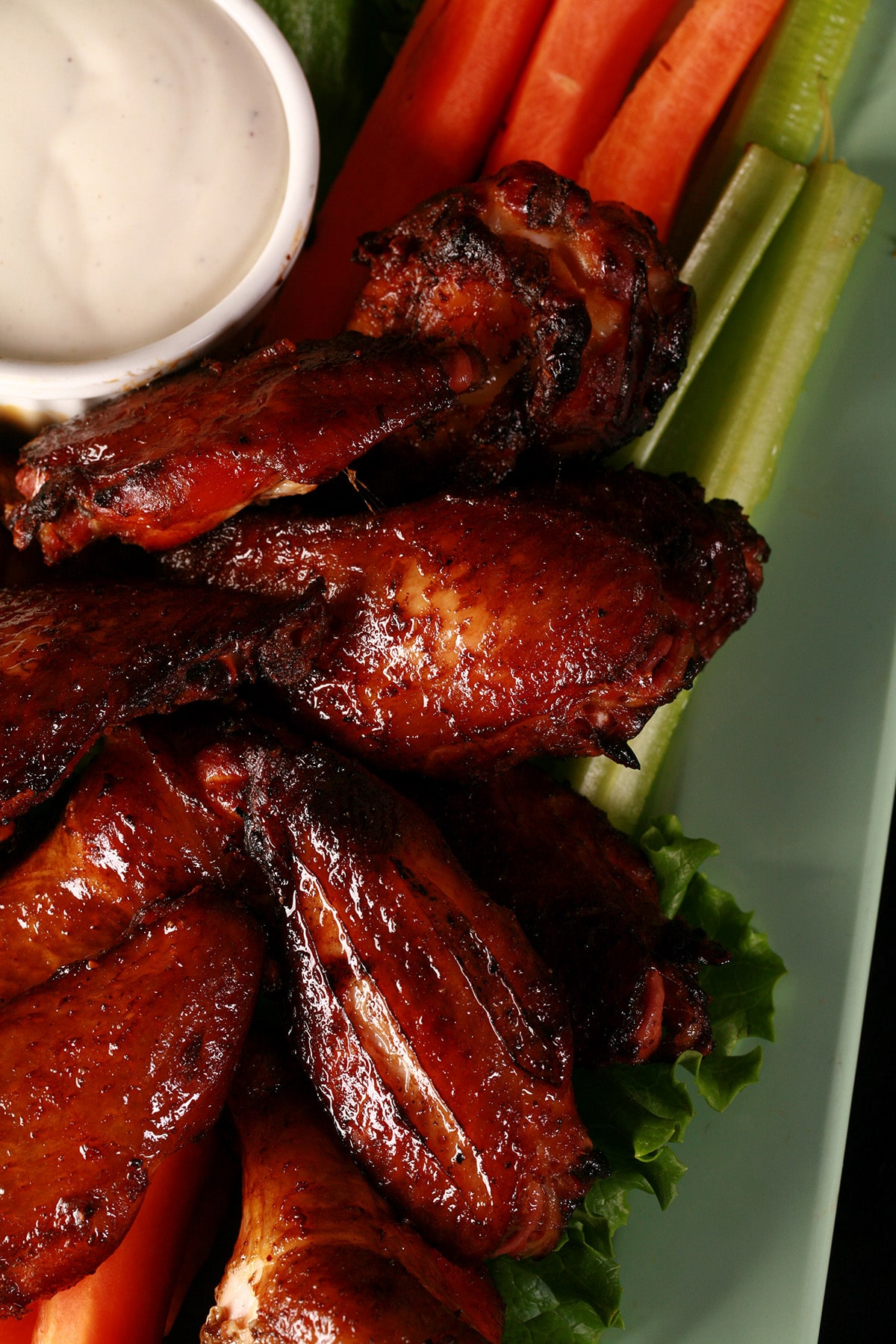 A platter of crispy smoked wings.