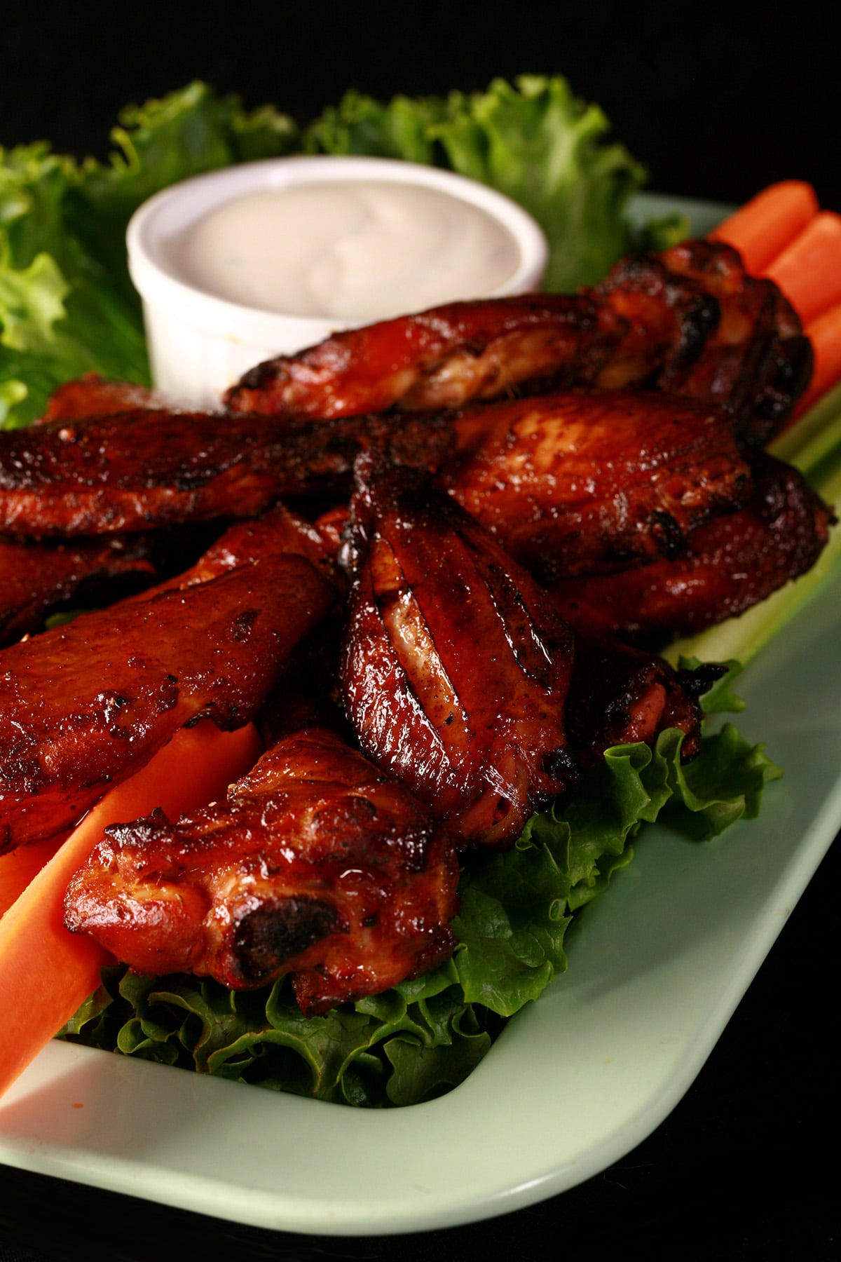 A platter of crispy smoked chicken wings.