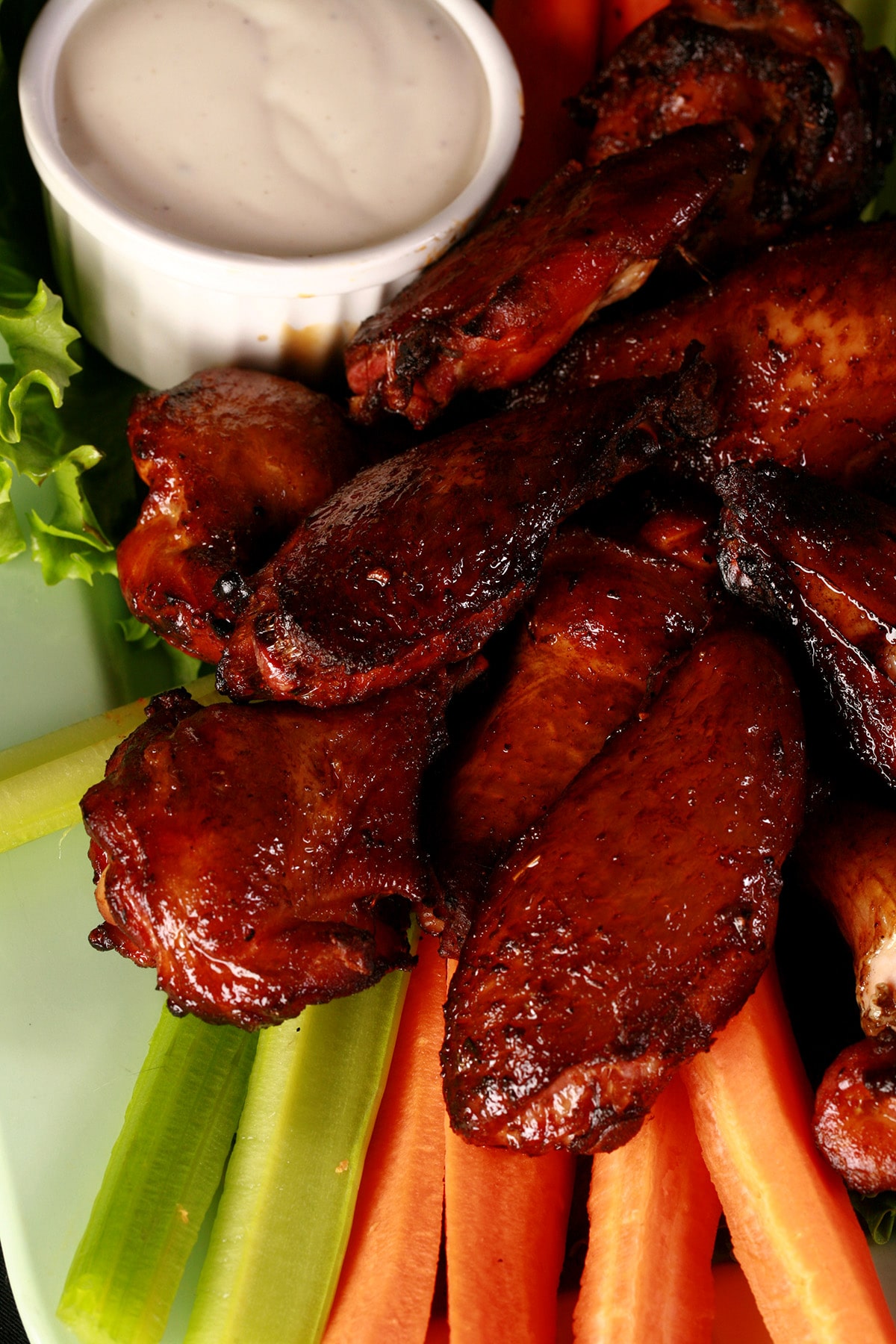 A platter of crispy smoked wings.