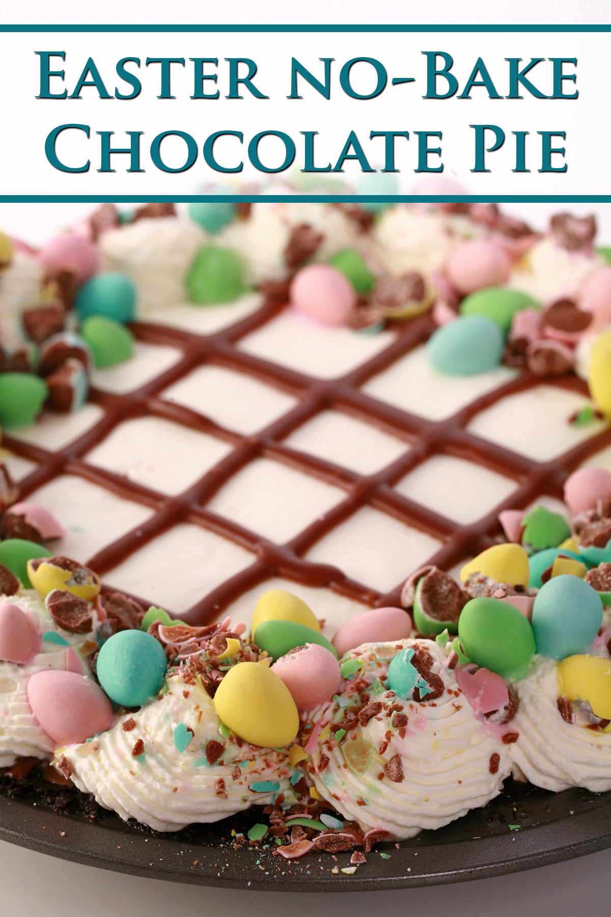 An Easter no bake chocolate cream pie with whipped cream and Cadbury Mini Eggs.