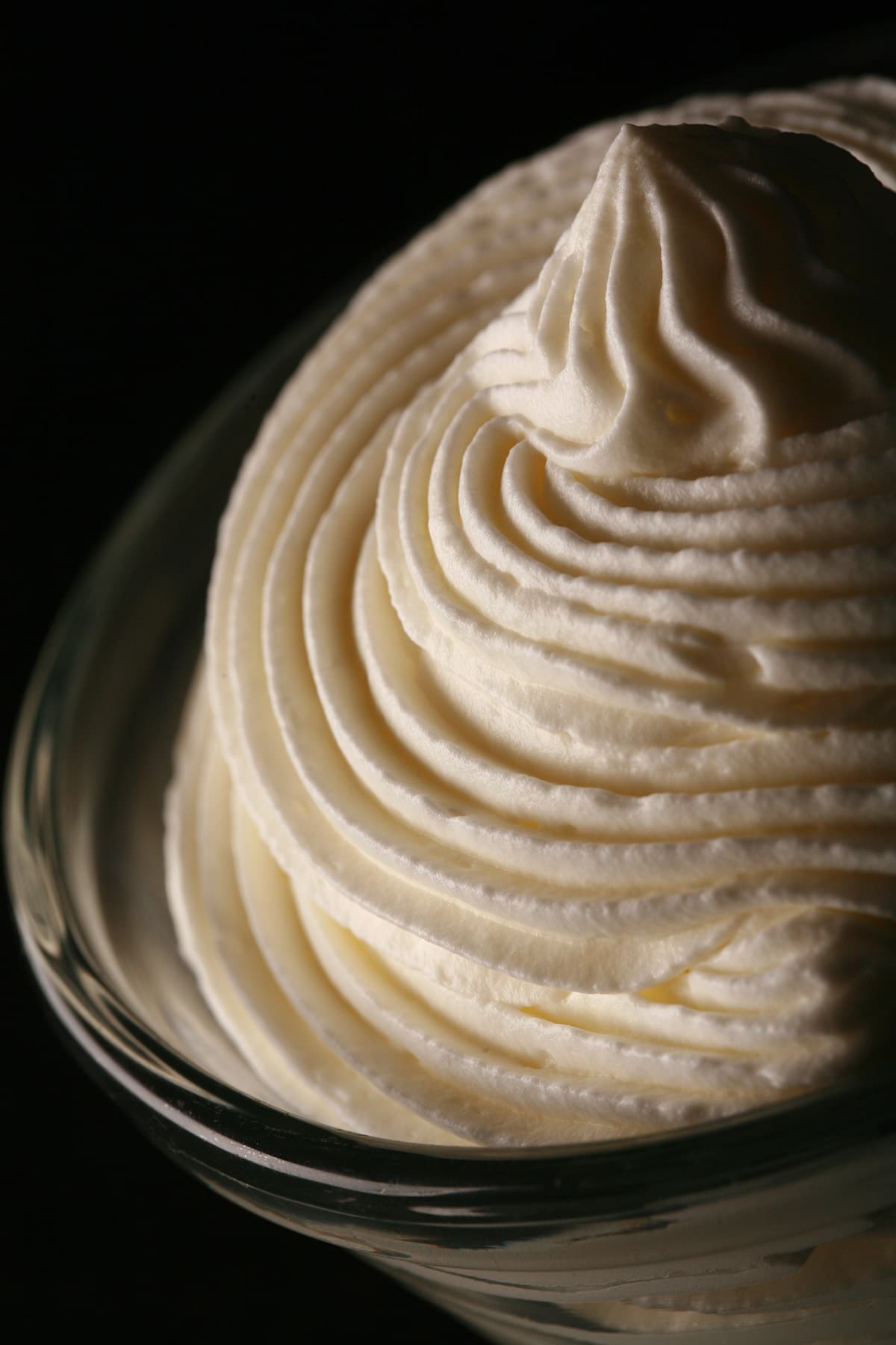 A bowl of stabilized whipped cream frosting.