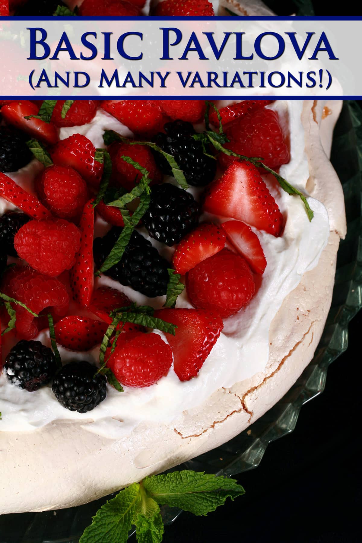 A vanilla pavlova, topped with raspberries, strawberry slices, and blackberries.