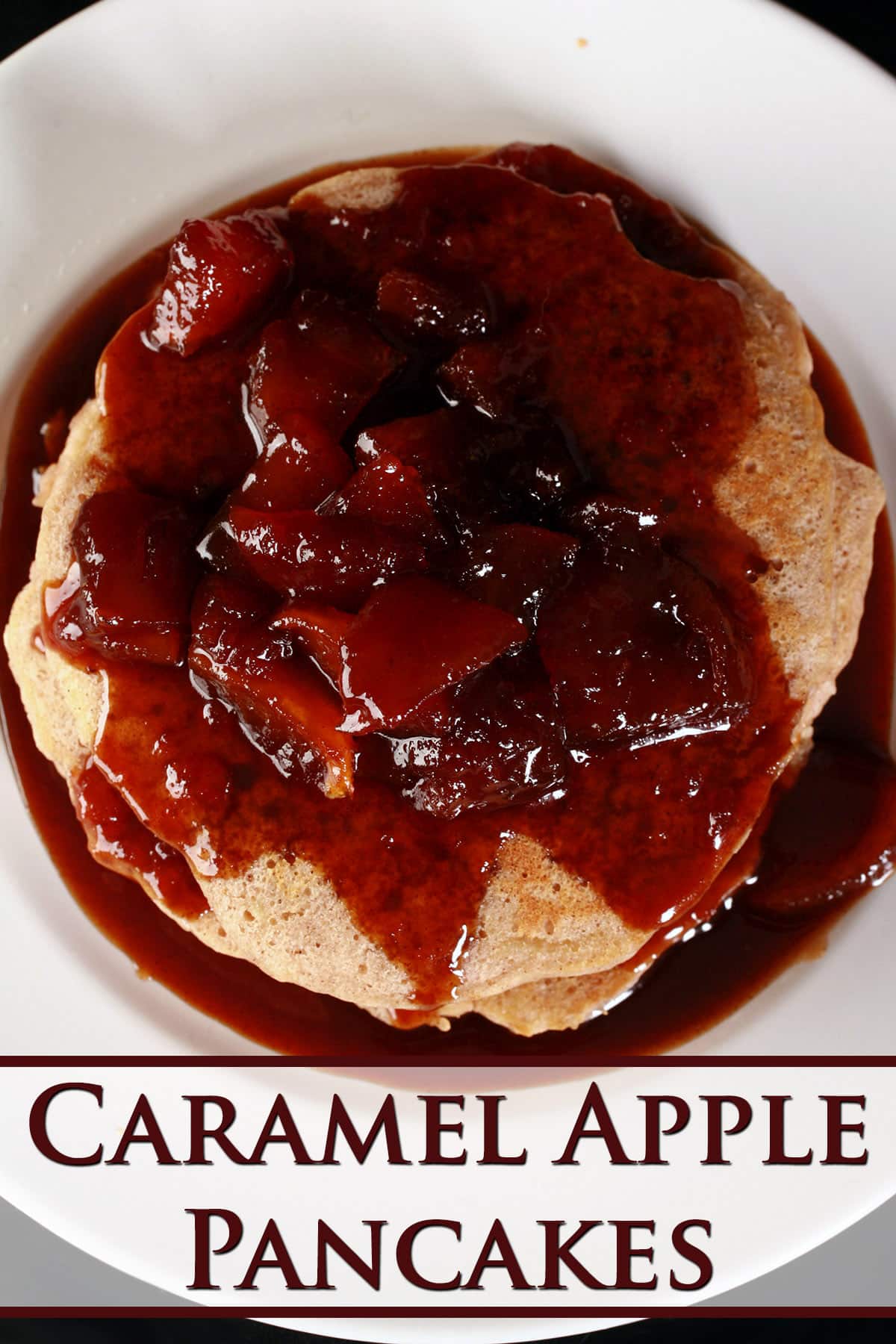 A stack of apple pancakes topped with caramel apple sauce.
