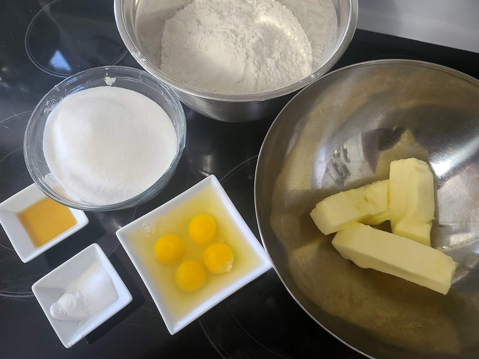 All of the ingredients for this recipe, arranged on a stove top.