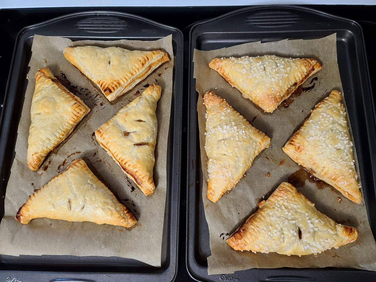 2 pans of freshly baked turnovers.
