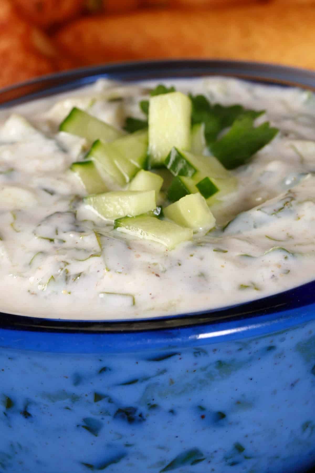 A close up view of a bowl of raita.