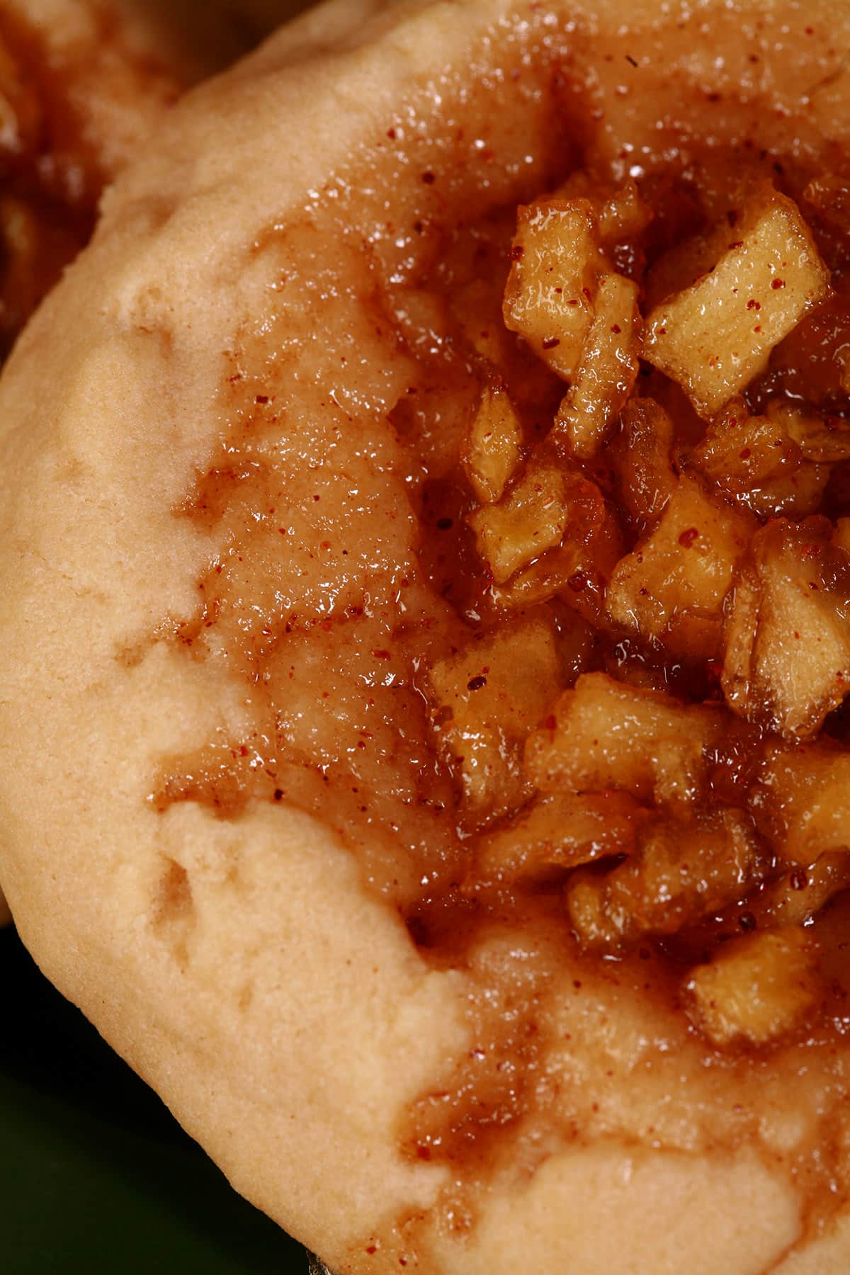 A close up view of an apple pie cookie.