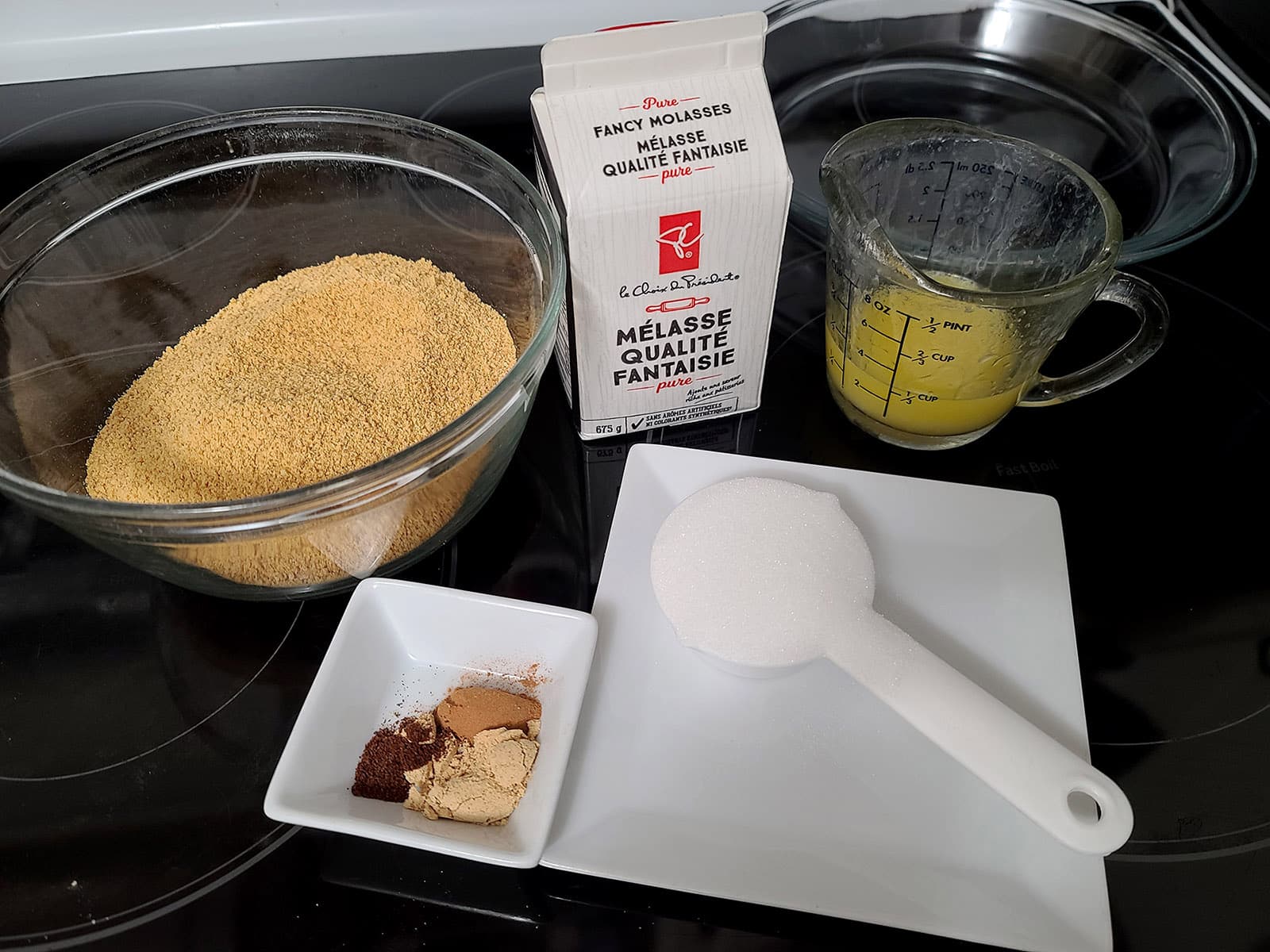 The crust ingredients laid out on a stove top.