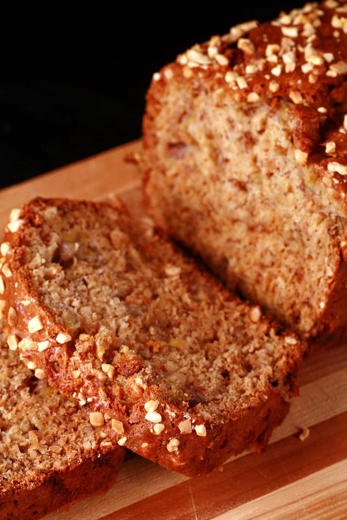 A sliced loaf of peanut butter banana bread.