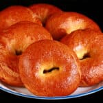 A plate of paska bagels - lemon orange Easter bagels.