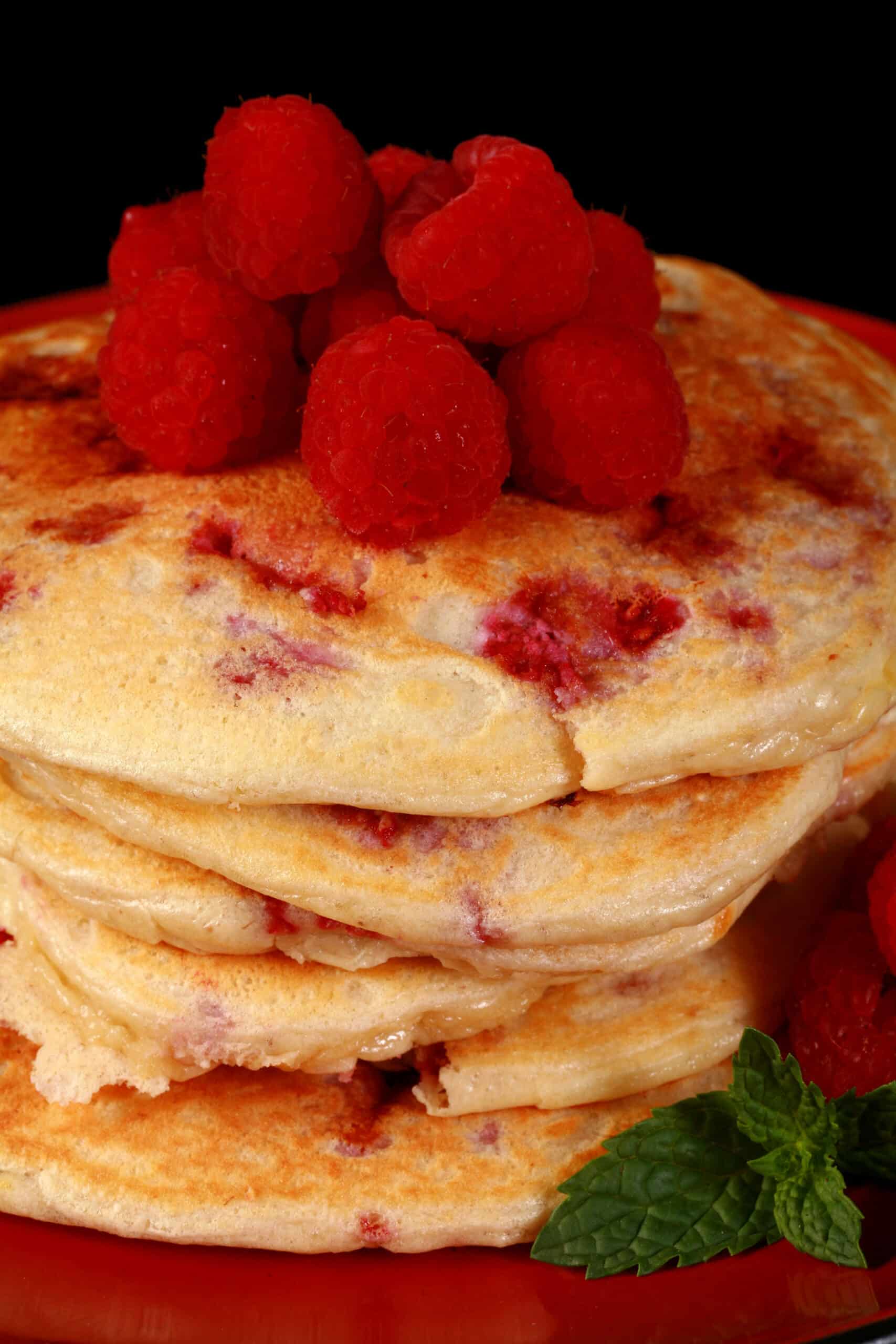 A stack of low carb raspberry protein pancakes.