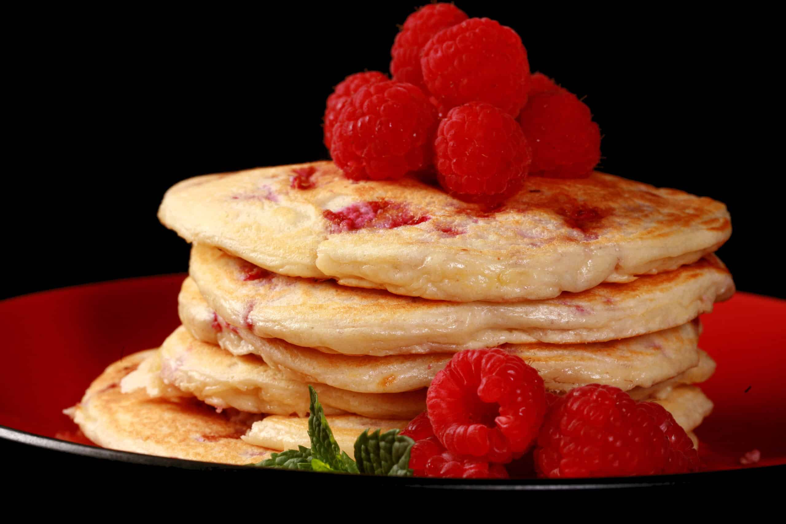A plate of raspberry protein pancakes.