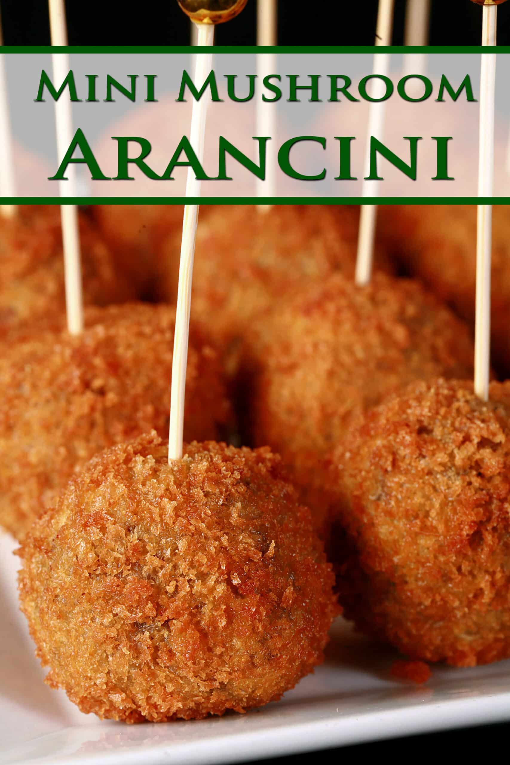 16 mini mushroom risotto balls on a plate, each with a tall toothpick topped with a gold ball. Overlaid text says mini mushroom arancini.